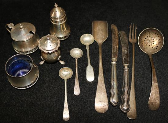 Silver cutlery and condiments
